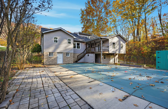 45_45_dsc03930back of home, swimming pool, back yard, back deck, back patio, wood siding, brick, exterior entry doors