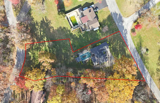 aerial view of home, approximate parcel outline, front yard, back yard, trees, pool, neighboring homes