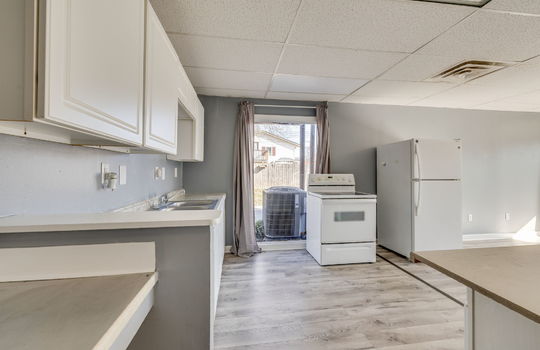 kitchen, window, electric range, refrigerator, cabinets, countertops, sink