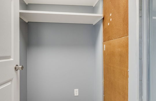 linen closet, bathroom storage, tile flooring