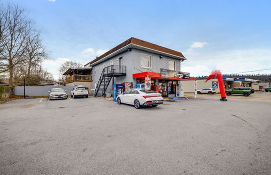 commercial front of apartment building, parking spaces