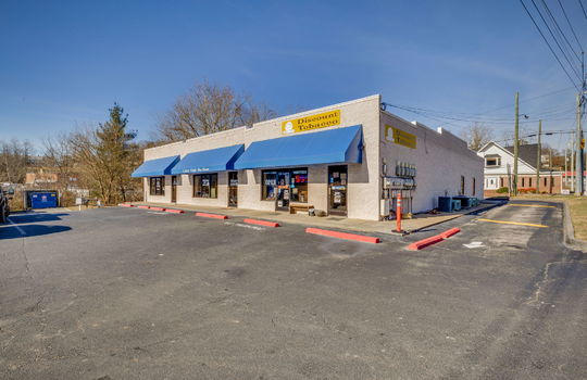 strip mall exterior, parking lot, block exterior