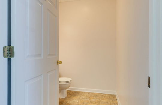 private bathroom, toilet, sink, ceiling tiles