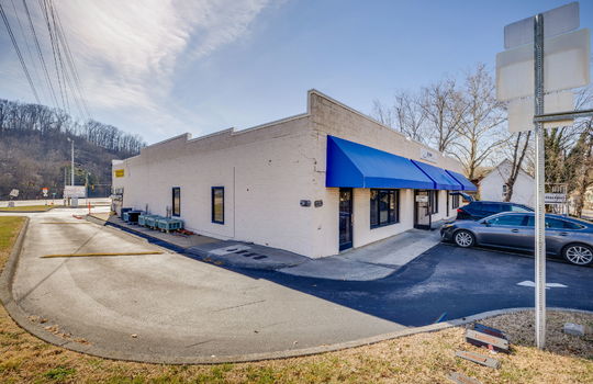strip mall exterior, parking lot, block exterior
