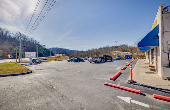 strip mall exterior, parking lot, block exterior