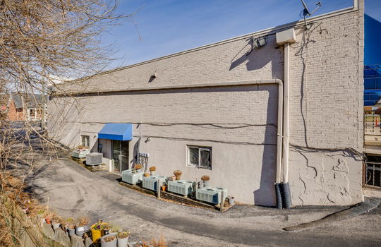 strip mall exterior, parking lot, block exterior
