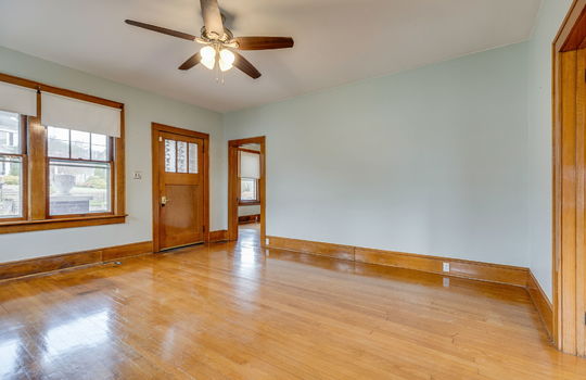 living room, front door, ceiling fan, window, hardwood flooring, doorway