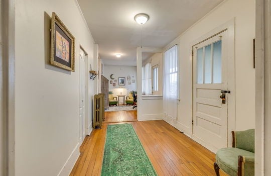 office area/sitting area/ hallway, hardwood flooring, exterior doors, windows