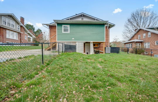 back of home, fencing, back yard, brick & siding exterior