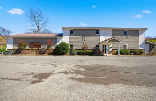 Veterinary Hospital for Sale, 9787 SqFt, 1.95+/- acres, parking lot, metal siding, vinyl siding, stone, covered entryway, front entryway, parking lot