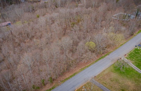 aerial photo, land for sale, 1.09+/- acres, road, trees, neighboring properties