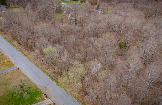 aerial photo, land for sale, 1.09+/- acres, road, trees, neighboring properties