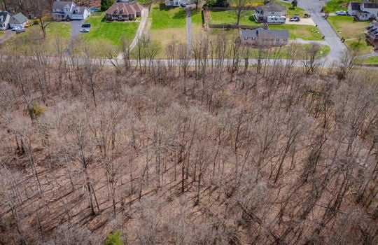 aerial photo, land for sale, 1.09+/- acres, road, trees, neighboring properties