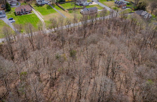 aerial photo, land for sale, 1.09+/- acres, road, trees, neighboring properties