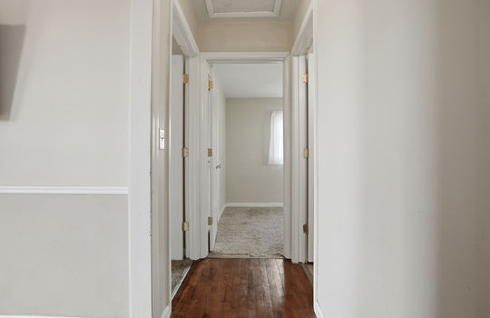 hallway, hardwood flooring, doors