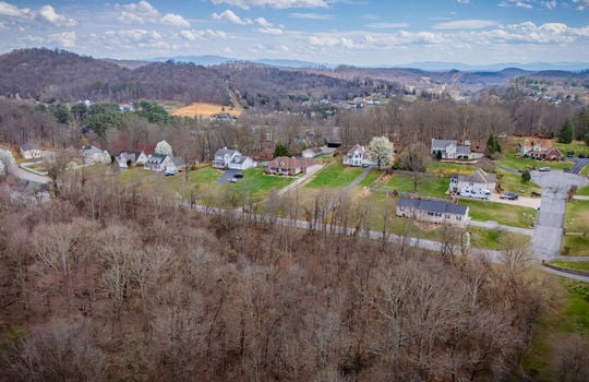 aerial photo, land for sale, 1.09+/- acres, road, trees, neighboring properties