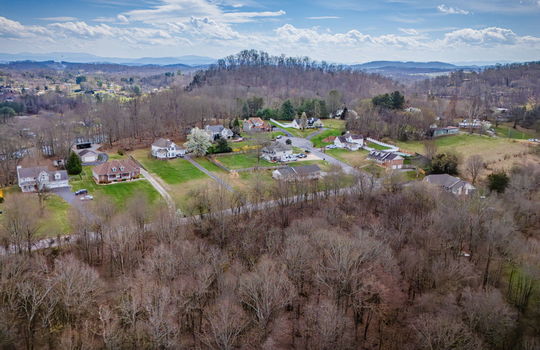 aerial photo, land for sale, 1.09+/- acres, road, trees, neighboring properties