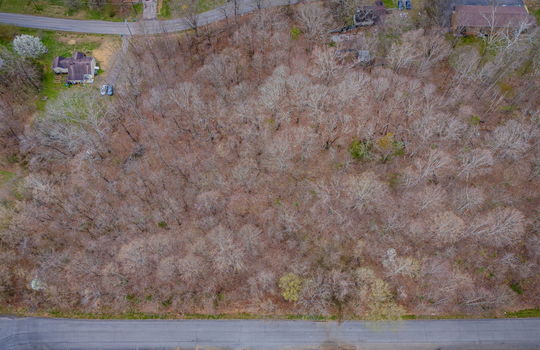 aerial photo, land for sale, 1.09+/- acres, road, trees, neighboring properties