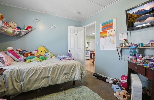 bedroom, carpet, door to kitchen