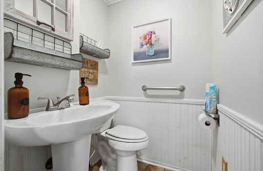 bathroom, toilet, sink, tile flooring