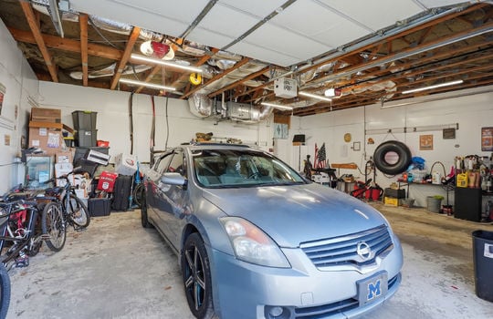 Garage, concrete flooring, garage door