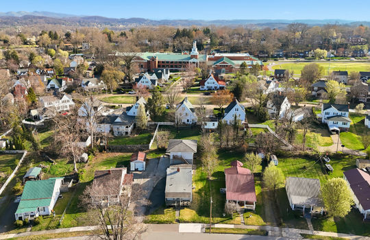 overhead aerial view of property, apartment, driveway, neighboring homes, neighborhood view, mountain views