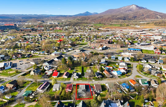 aerial view, apartment, property outline, neighboring homes, street, sidewalks, mountain views
