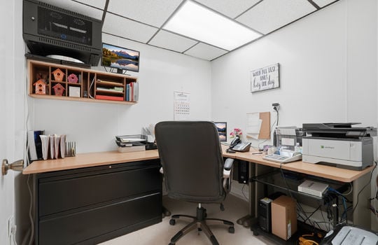 private office area, desk, tile flooring, ceiling tiles, fluorescent lighting