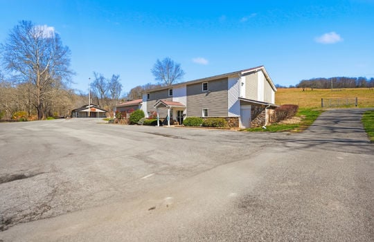 Veterinary Hospital for Sale, 9787 SqFt, 1.95+/- acres, parking lot, metal siding, vinyl siding, stone, covered entryway, front entryway, parking lot, driveway