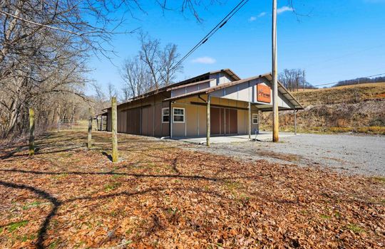 barn area, parking lot, metal roof, barn doors, land, mountain views