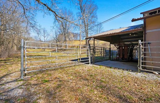 back of barn area, metal gates, storage, land, mountain views