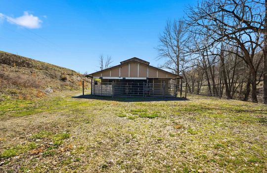 back of barn area, metal gates, storage, land, mountain views
