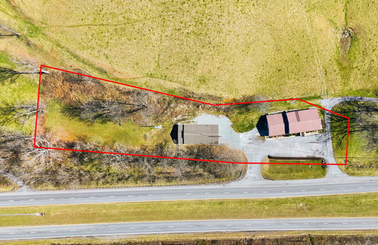 aerial photo, property outline, 1.95 +/- acres, highway, veterinary clinic, barn, land/acreage
