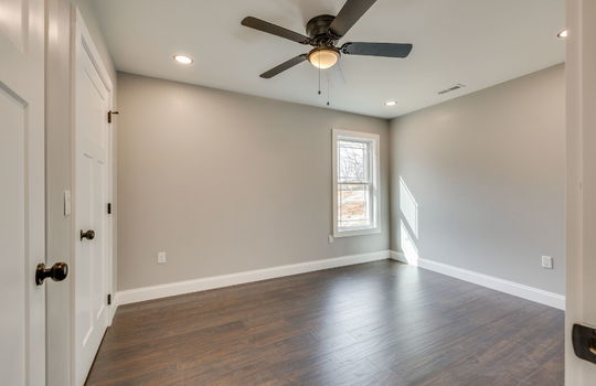 bedroom, laminate flooring, window, ceiling fan, closet