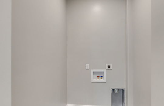 laundry area, washer hookups, dryer hookups, tile flooring, recessed lighting