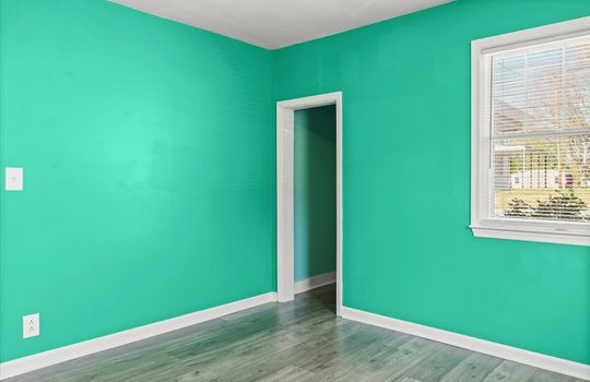 bedroom, luxury vinyl flooring, walk-in closet, window