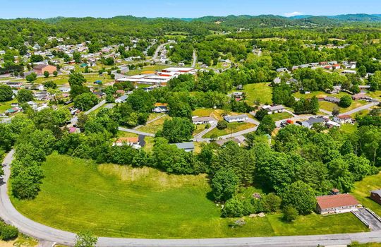 1.41 +/- acres, 3 parcels, For Sale, 341 ft road frontage, neighboring homes, aerial photo, mountains