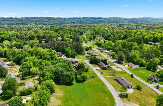 1.41 +/- acres, 3 parcels, For Sale, 341 ft road frontage, neighboring homes, aerial photo, mountains