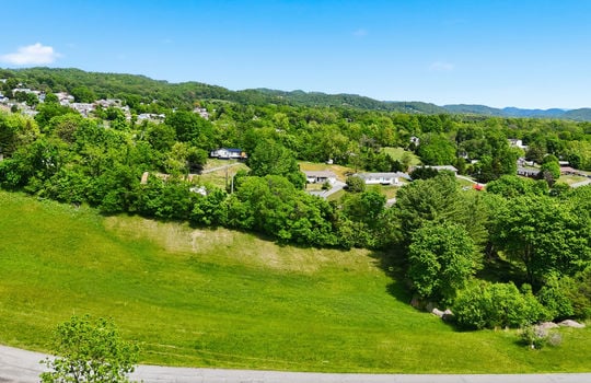 1.41 +/- acres, 3 parcels, For Sale, 341 ft road frontage, neighboring homes, aerial photo, mountains