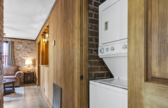 laundry space, brick wall, hallway