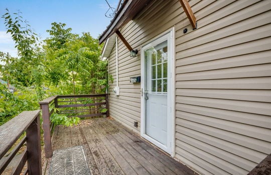 front porch, front door, storm door, vinyl siding