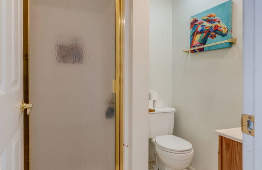 bathroom, shower, tile flooring, toilet, sink