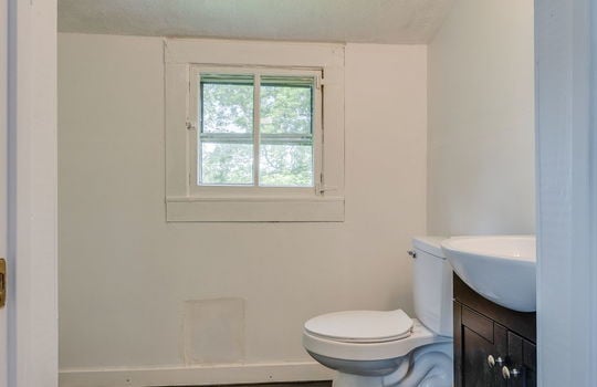 bathroom, sink, toilet, window, laminate flooring