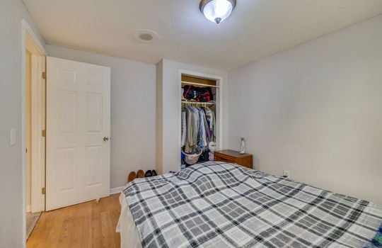 bedroom, laminate flooring, closet