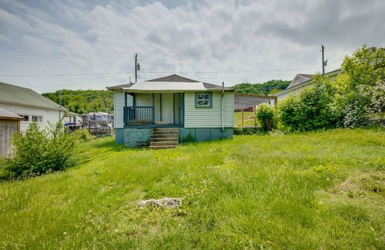 back of home, cottage/bungalow, covered back porch, steps to back porch