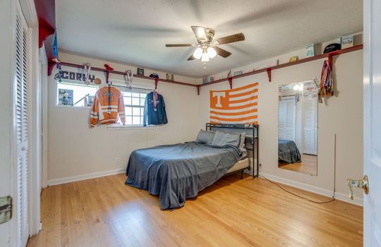 bedroom, ceiling fan, hardwood flooring, closets