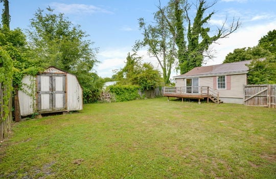 back yard, back of home, back deck, shed, fencing