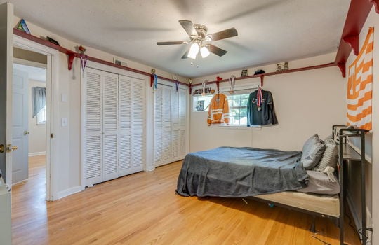bedroom, ceiling fan, hardwood flooring, windows, double closets