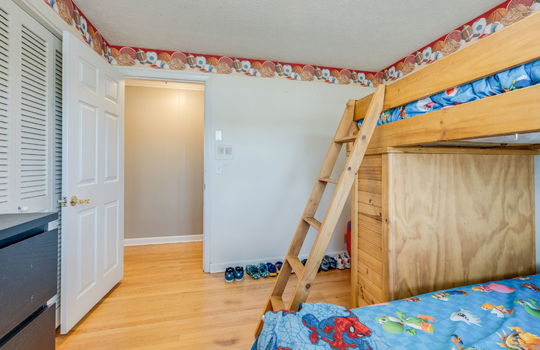 bedroom, closet, hardwood flooring, door