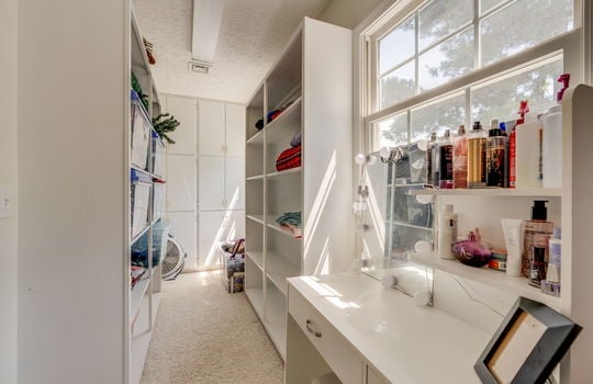 walk-in closet, custom shelving, window
